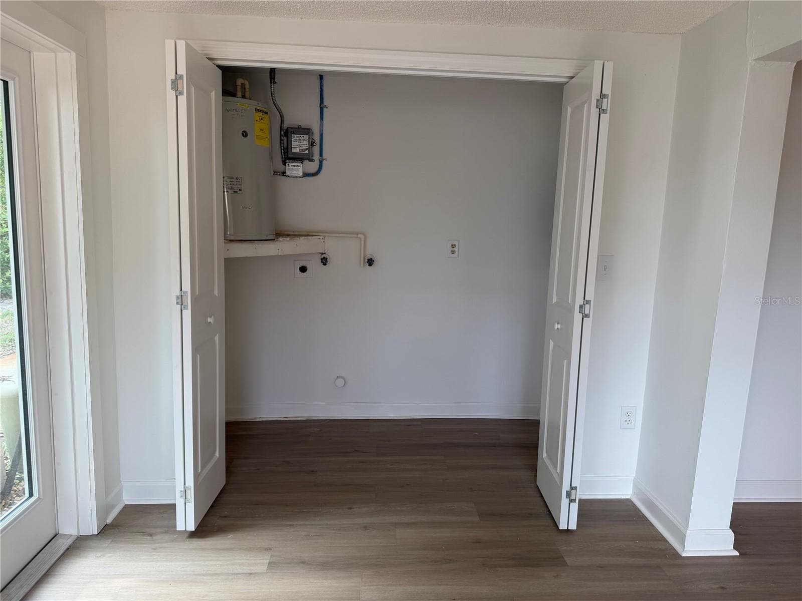 Laundry Closet and Electrical Panel/Hot Water Heater - 4412 SUNSTATE DR #A, NEW PORT RICHEY