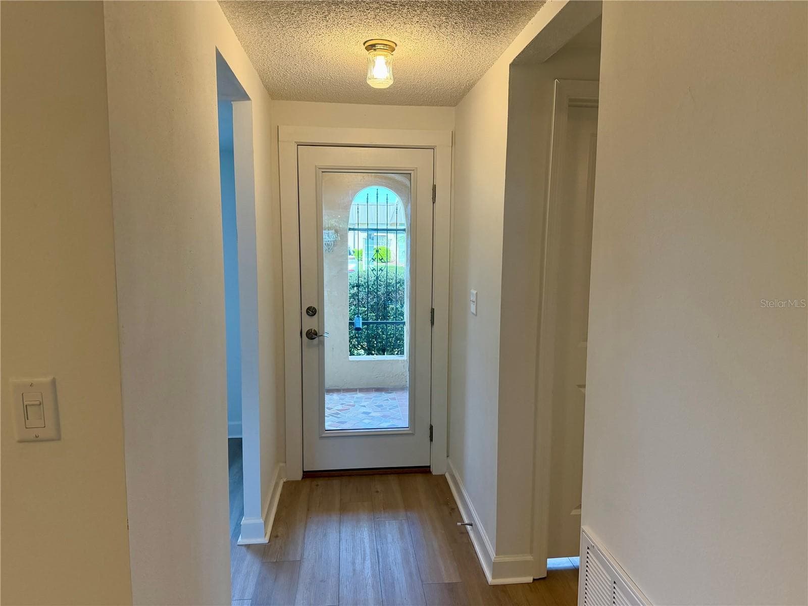 View from Dining Area to Front Door. - 4412 SUNSTATE DR #A, NEW PORT RICHEY