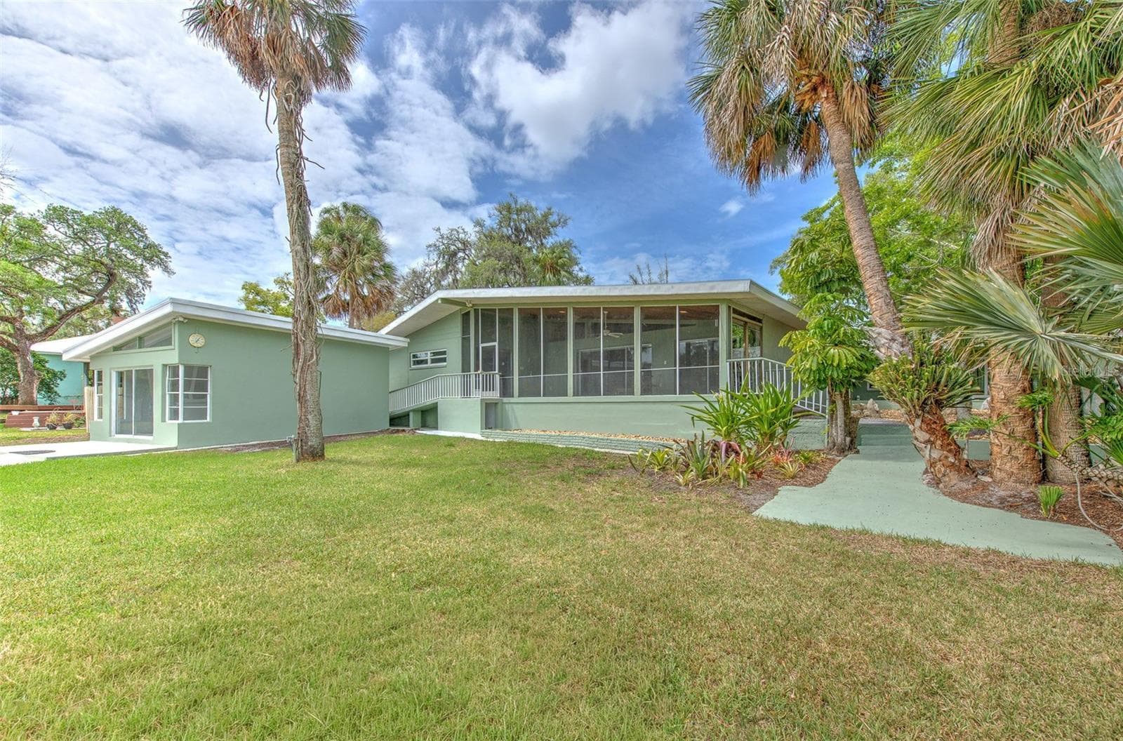 Backyard view of home from the water - 7102 MANDY LN, NEW PORT RICHEY