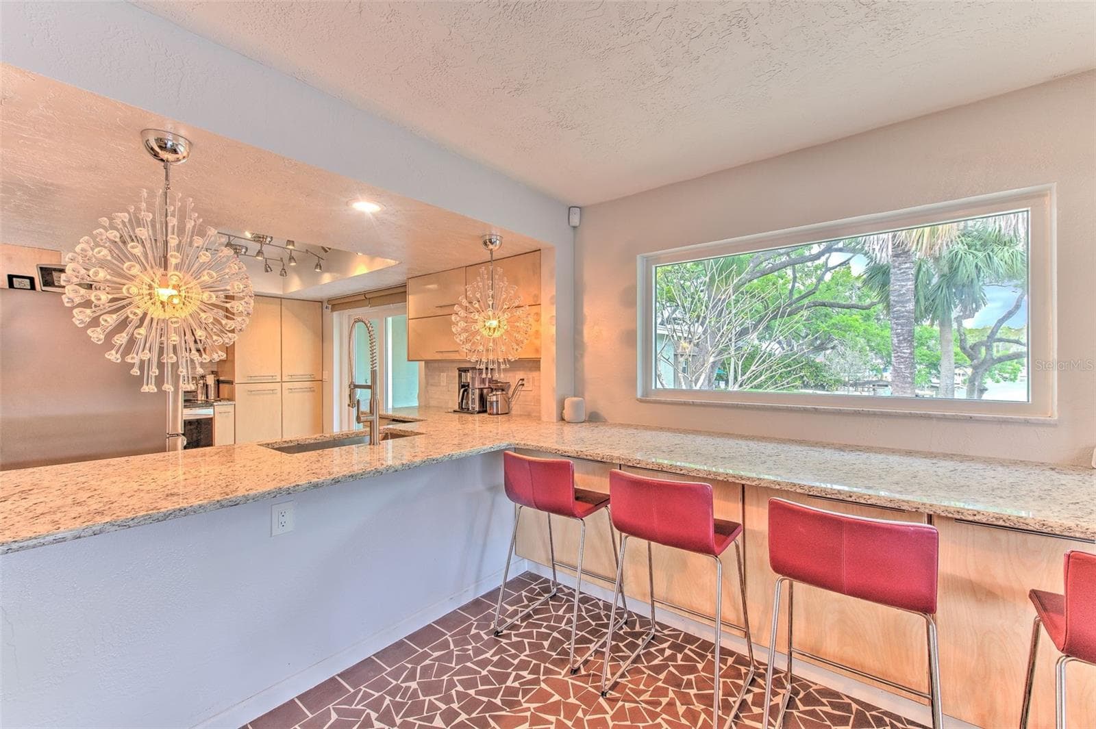 Beautifully Updated Kitchen w/ breakfast bar overlooking rock garden and water views - 7102 MANDY LN, NEW PORT RICHEY