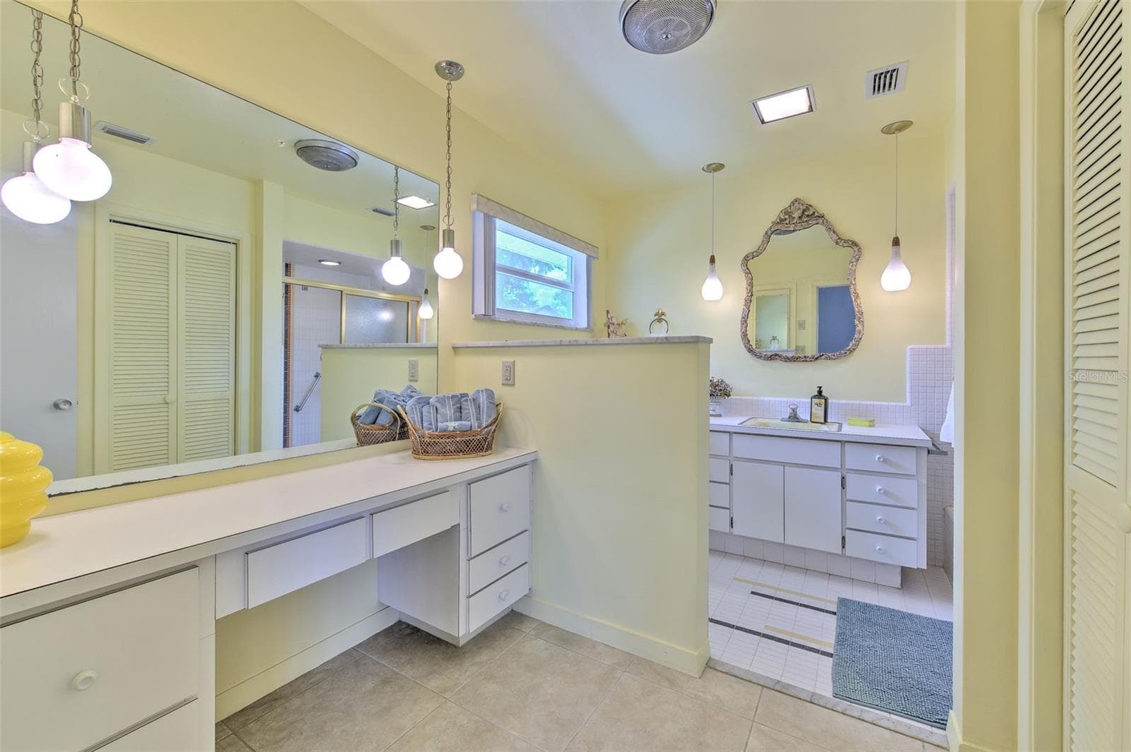 Master enSuite bathroom 2 with separate sink vanity, and separate makeup vanity area with full length medicine cabinet built in wall - 7102 MANDY LN, NEW PORT RICHEY