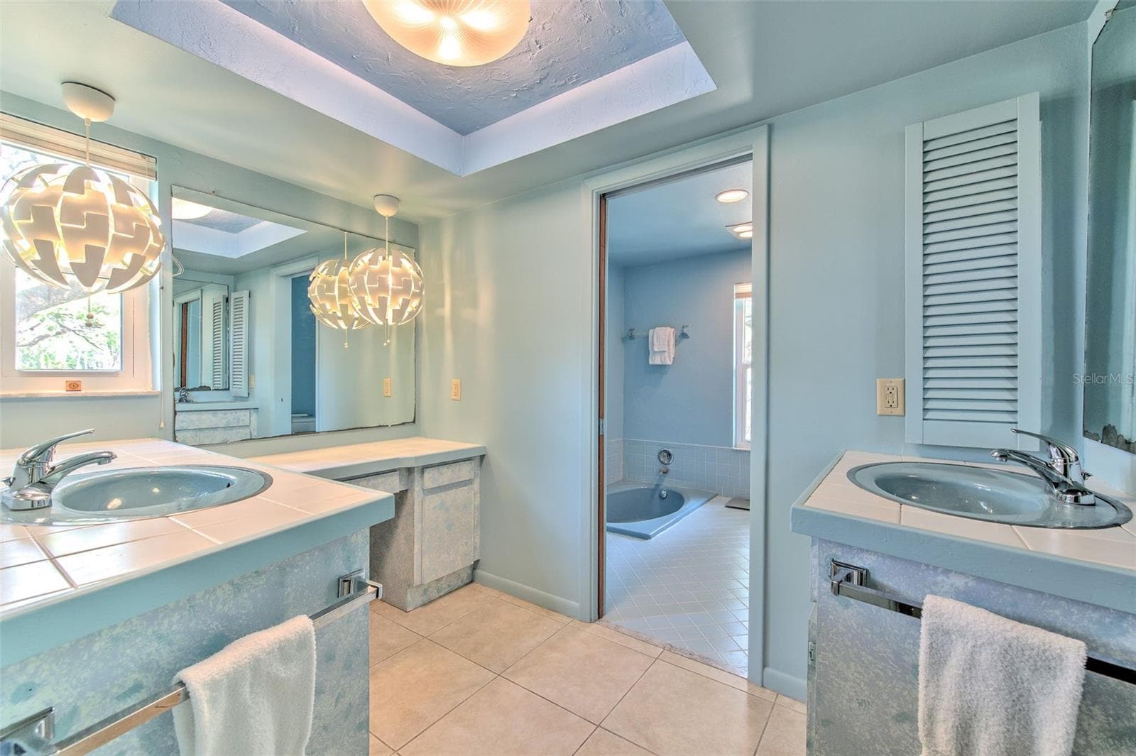 Master enSuite bathroom  with separate dual sink vanities and makeup vanity area - 7102 MANDY LN, NEW PORT RICHEY