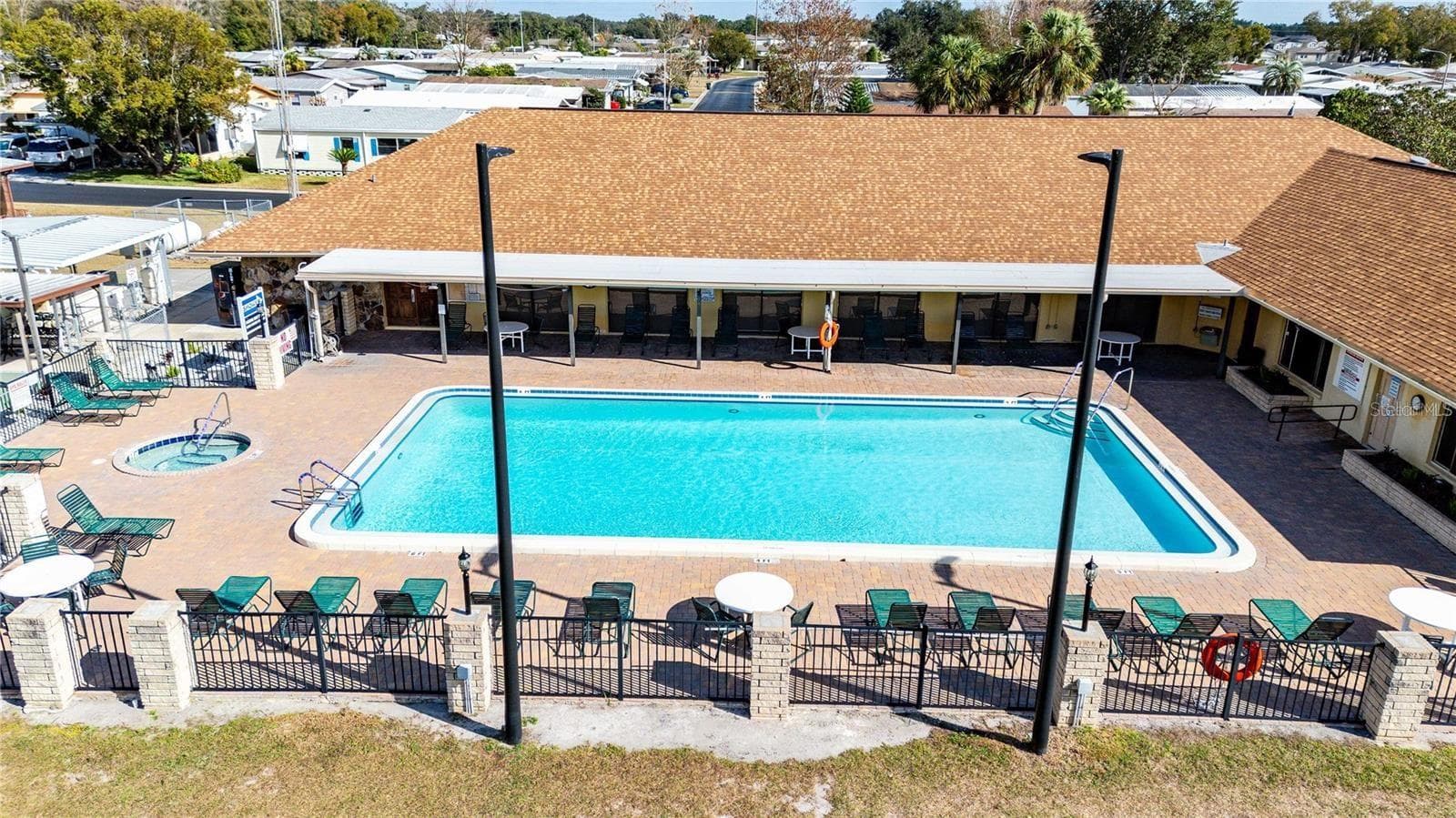 Community pool and hot tub. - 3210 HICKORY DR, WESLEY CHAPEL