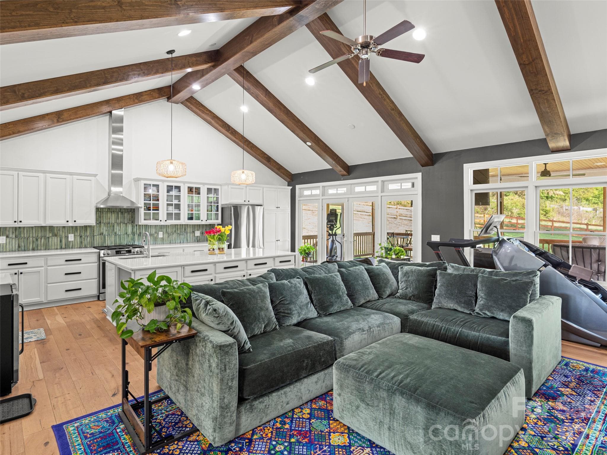Vaulted ceiling great room. Home is modernized throughout with thoughtful details tying into each room - 127 Rockbridge Road, Mills River