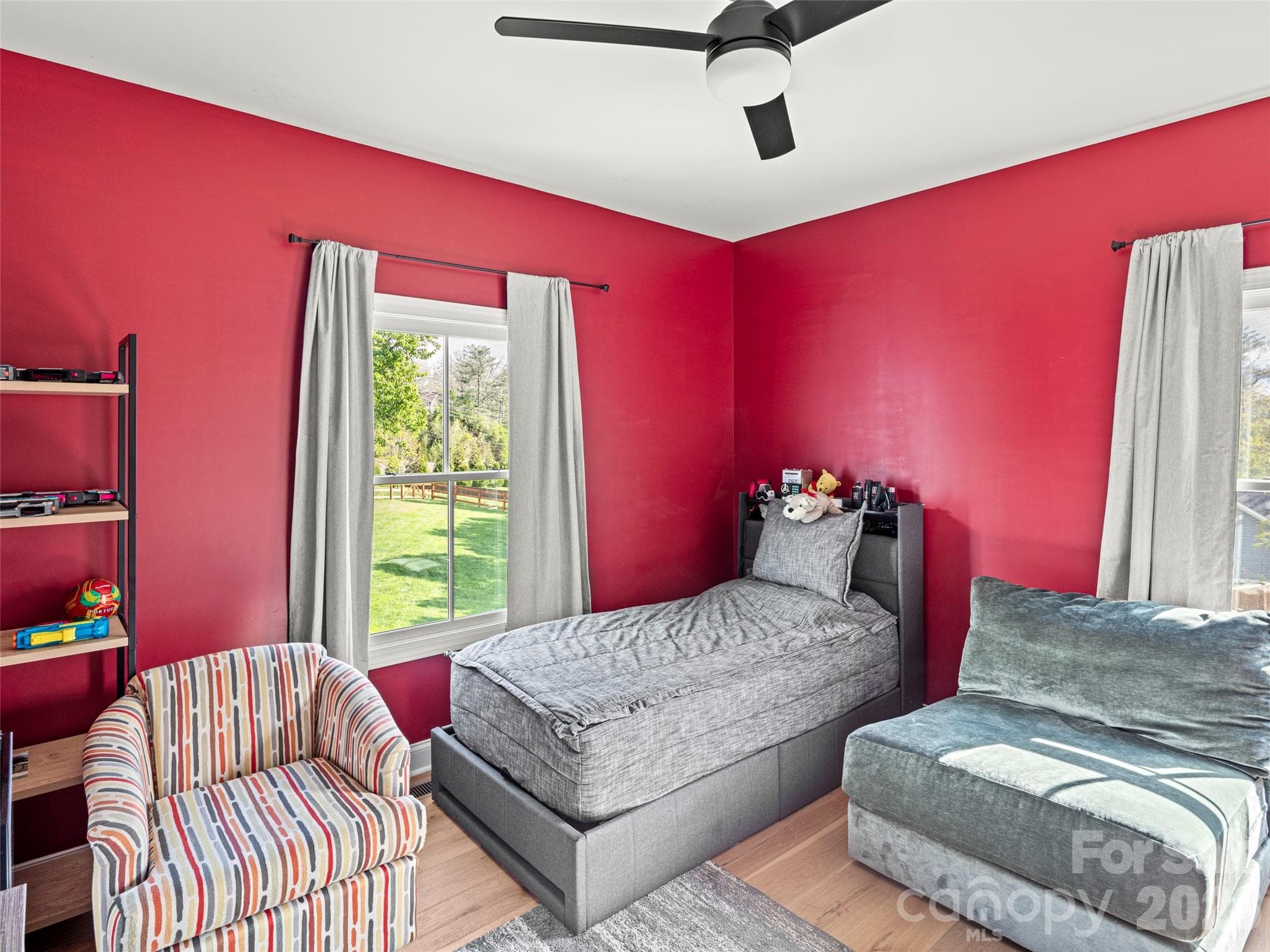 Bedroom #3 features a brand new ceiling fan to tie into whole house upgrades - 127 Rockbridge Road, Mills River