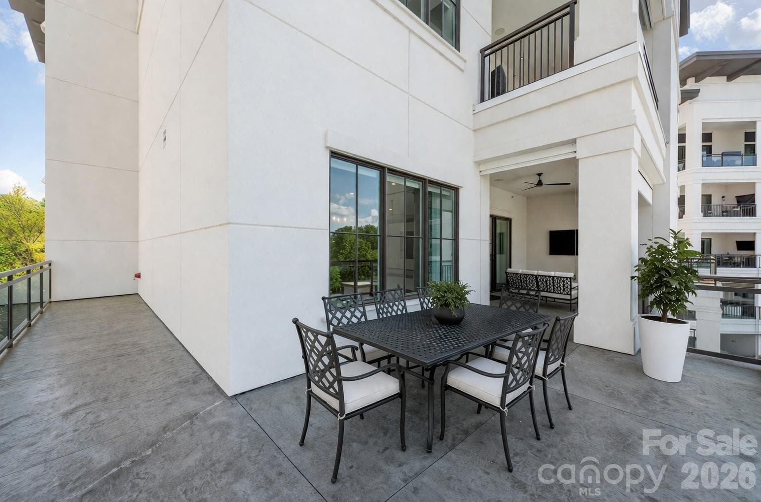 Virtually staged wrap around Lanai both uncovered and covered areas - 19329 Watermark Drive, Cornelius