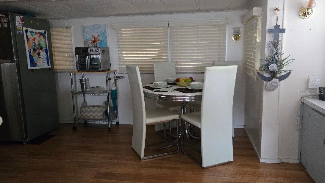 Dinning room table - 1475 FLAMINGO DR #56, ENGLEWOOD