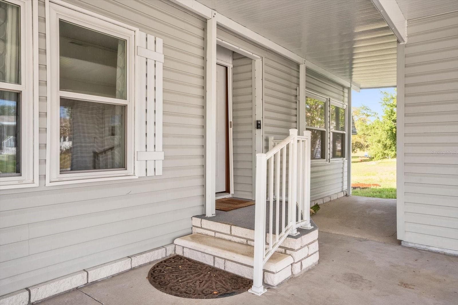 Low-Profile Entry with Wide Landing/Handicap accessible door - 4114 MYRTLE OAK CT #852, ZELLWOOD
