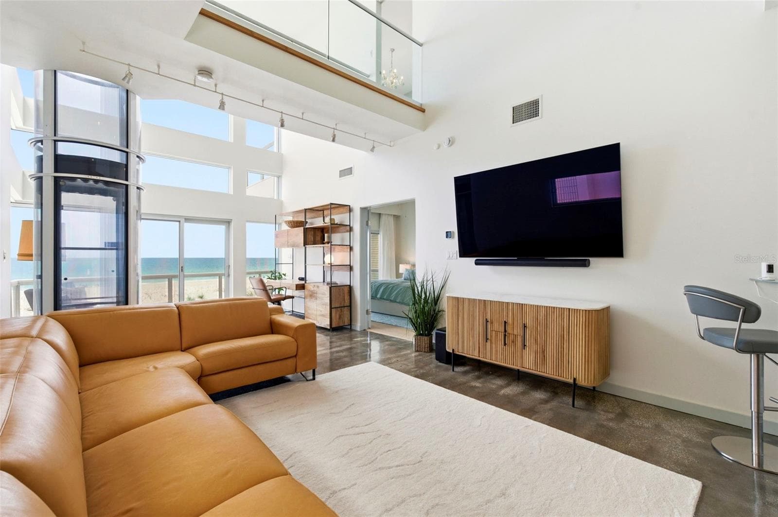 2 Story Living Room With Glass Elevator - 8680 W GULF BLVD, TREASURE ISLAND