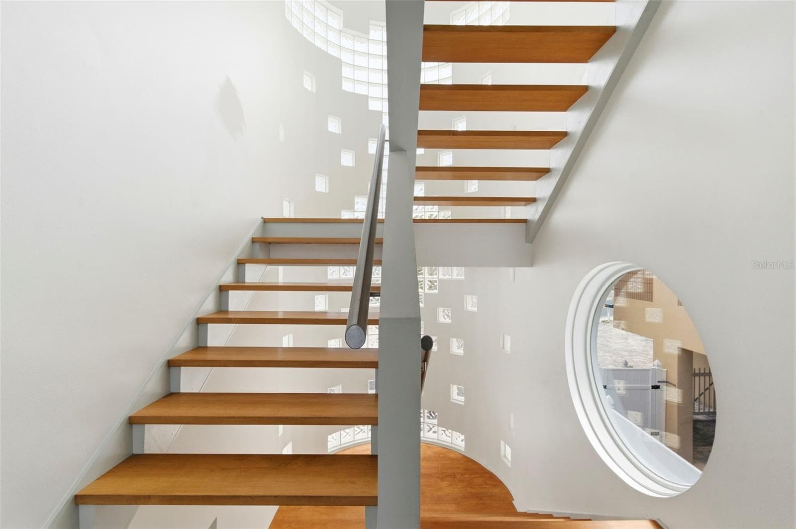 Main Stairwell to all Levels - 8680 W GULF BLVD, TREASURE ISLAND