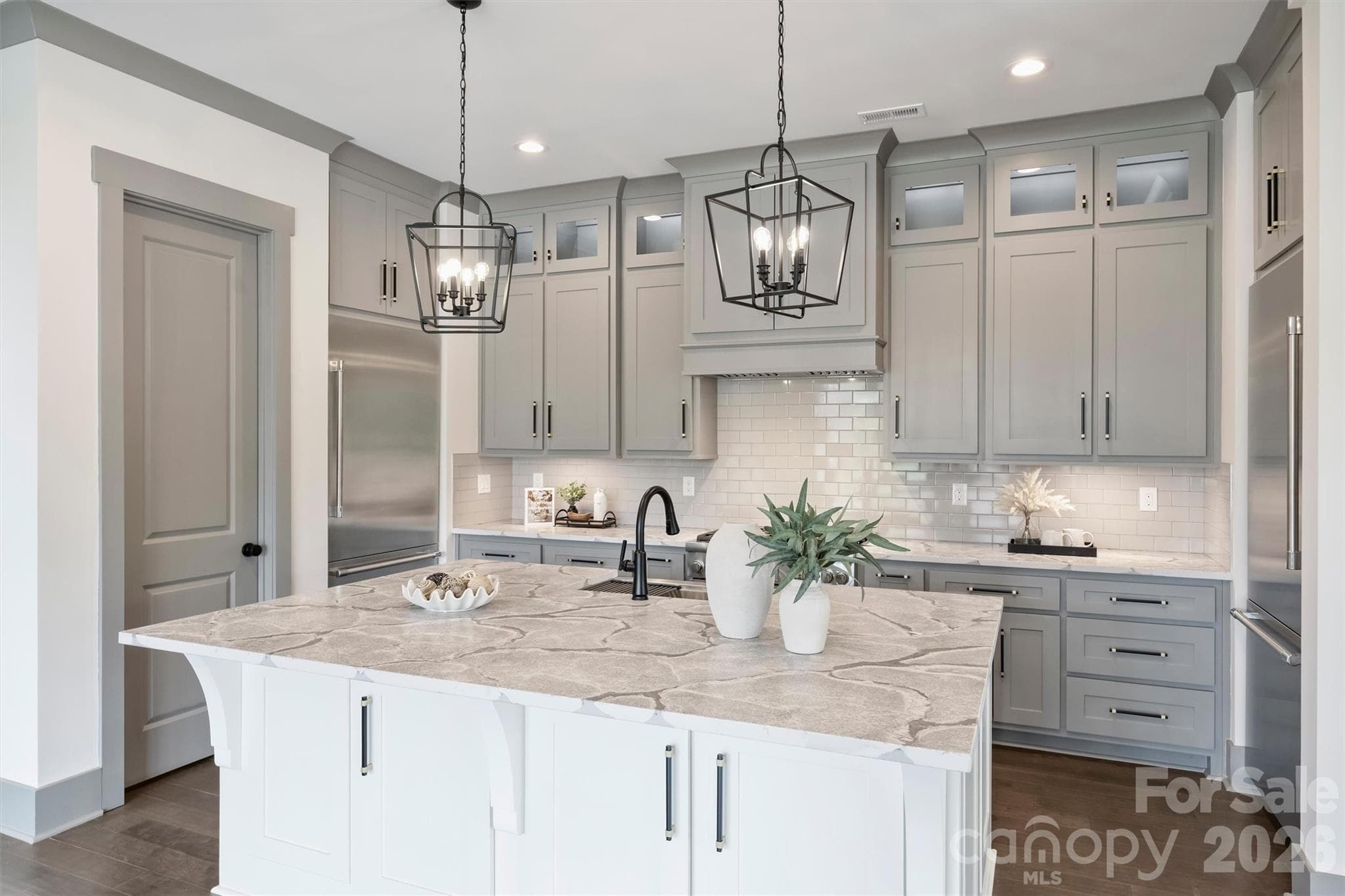 Gourmet Kitchen with oversized Island and 2 Thermador refrigerators - 8159 Fairview Road, Charlotte