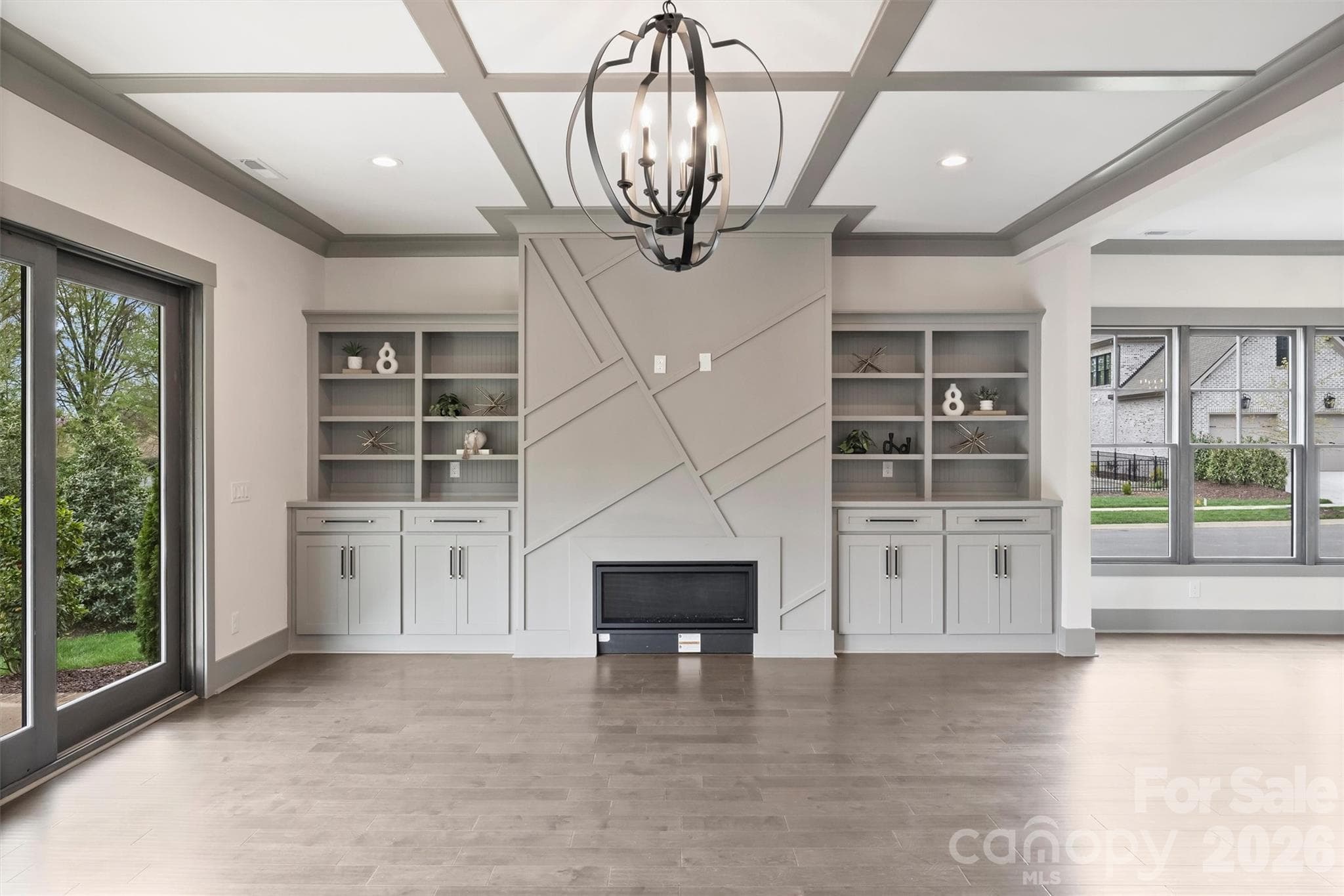 Great Room Gas Fireplace with Custom Built-in Shelving - 8159 Fairview Road, Charlotte
