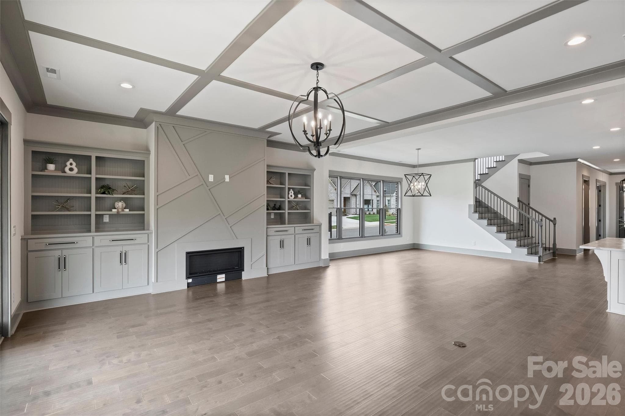 Great Room Gas Fireplace with Built-in Shelving - 8159 Fairview Road, Charlotte