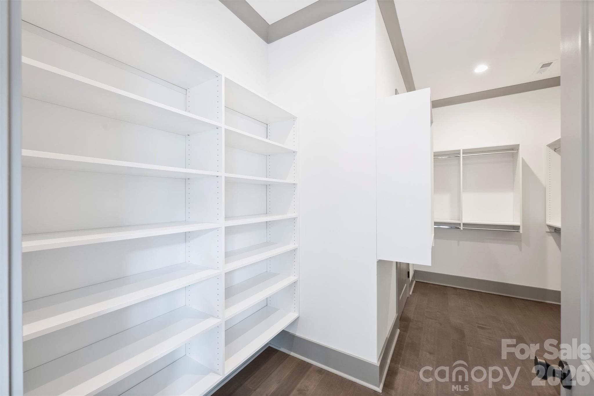 Primary Closet with Built-in Shelving - 8159 Fairview Road, Charlotte