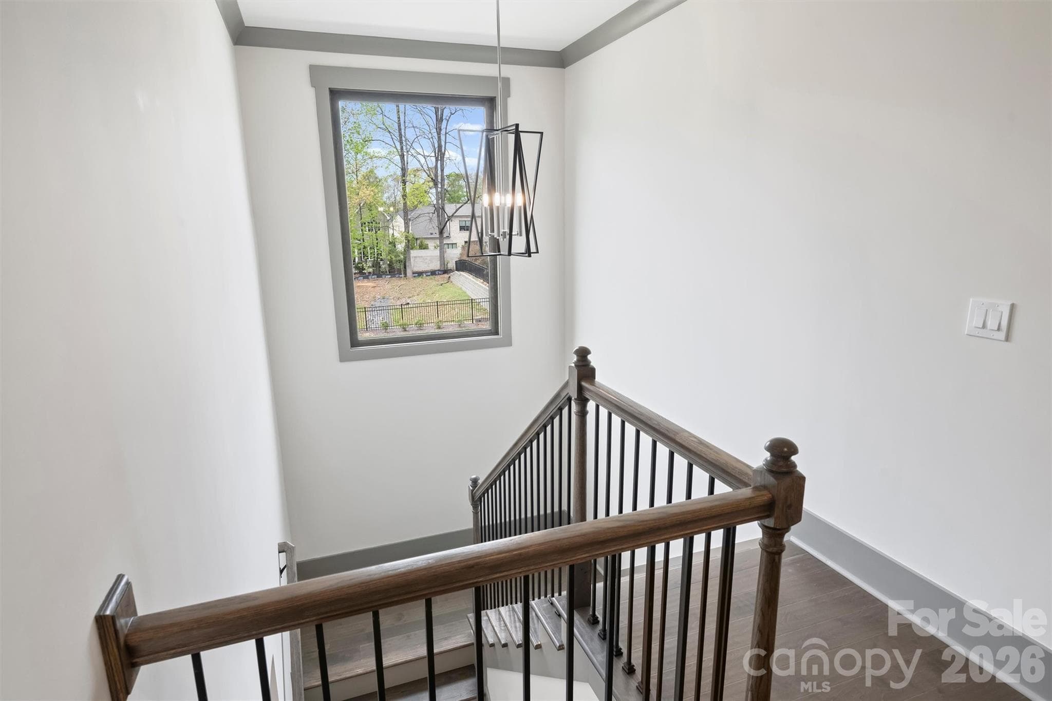 Beautiful picture window in stairwell - 8159 Fairview Road, Charlotte