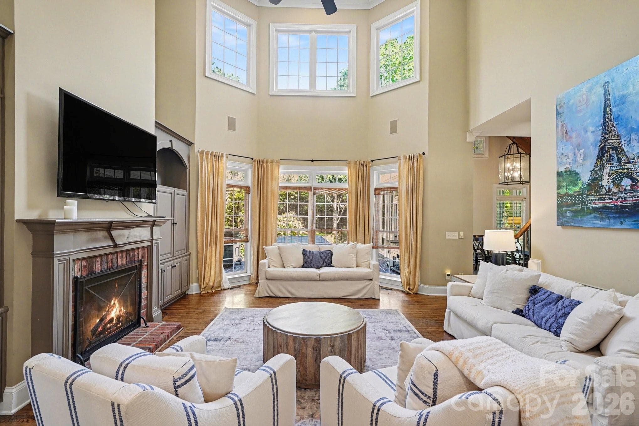 Large 2-story family room with Large windows and Built-ins - Cornelius