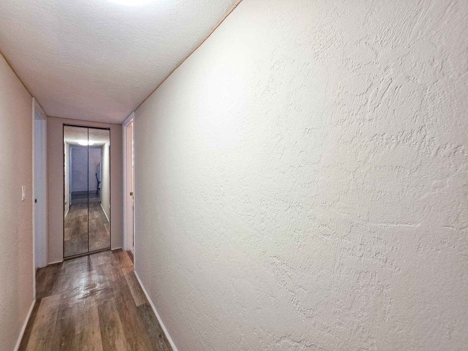Hallway to Bedrooms 2, 3 and Guest Bathroom - 3606 S PENINSULA DR #605, PORT ORANGE