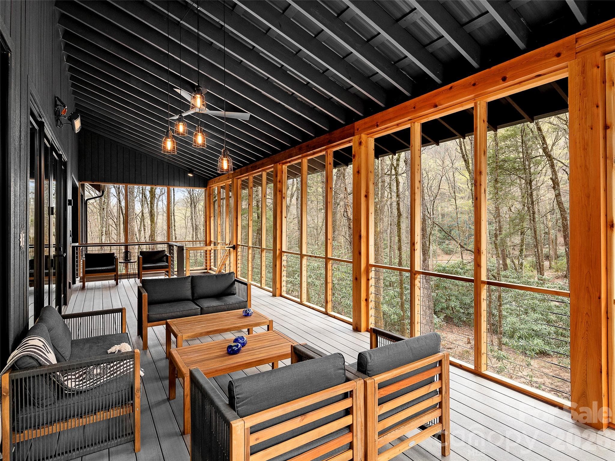 Enjoy the sound of the creek from the screened in and heated back porch - 80 Hemlock Circle, Black Mountain