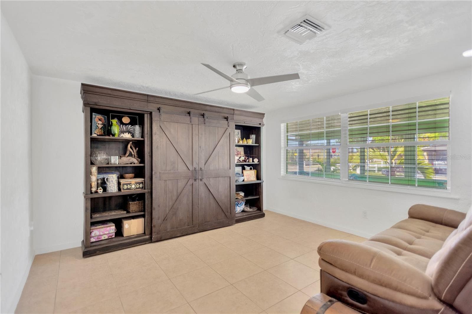 Beautiful Bonus Room located at front of house provides very versatile space. - 13724 COX AVE, HUDSON