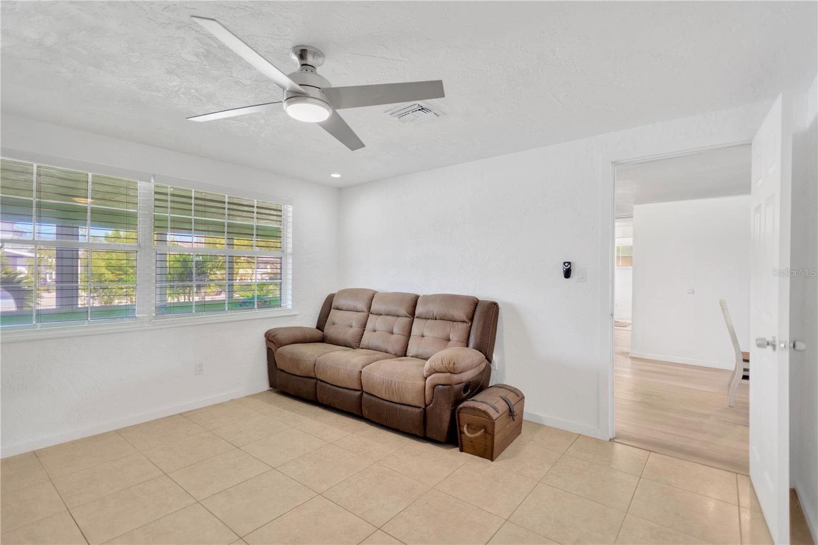 Another view of Bonus Room with full wall of windows for sparkling natural light. - 13724 COX AVE, HUDSON