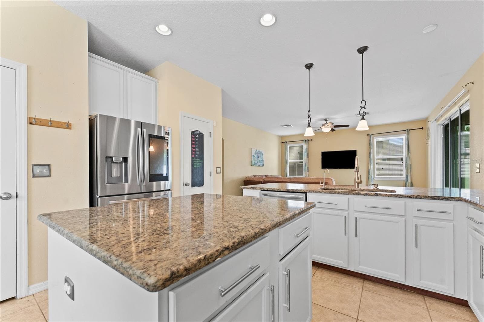 Kitchen with Large Island and Dinette Area - 11620 WARREN OAKS PL, RIVERVIEW