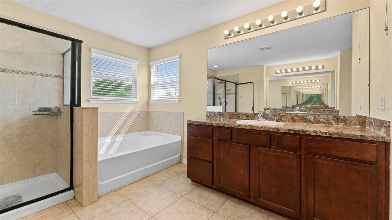 Primary Bathroom with 2 Separate vanities with storage - 11620 WARREN OAKS PL, RIVERVIEW