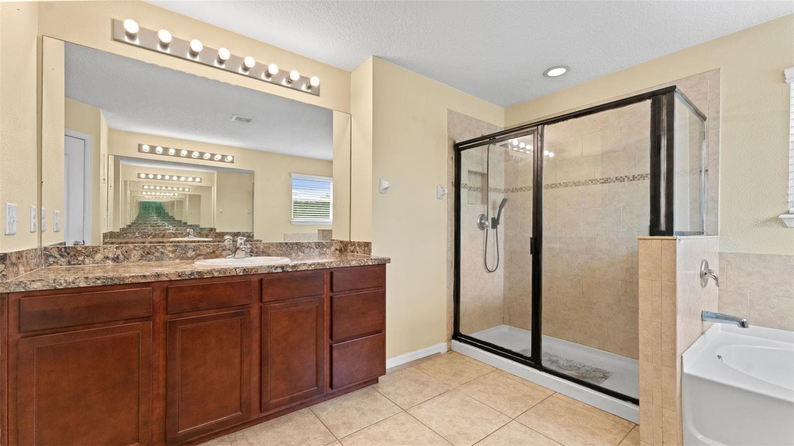 Primary Bathroom with 2 Separate vanities with storage - 11620 WARREN OAKS PL, RIVERVIEW