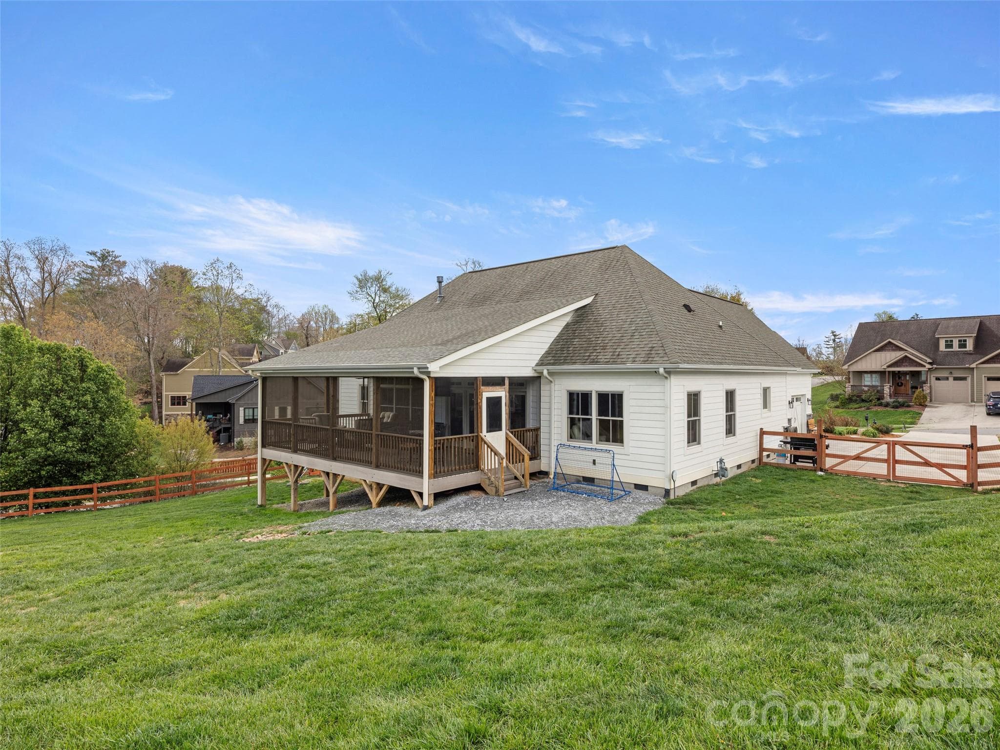 Imagine morning coffee and 3-season dining on your fully screened back deck - 127 Rockbridge Road, Mills River