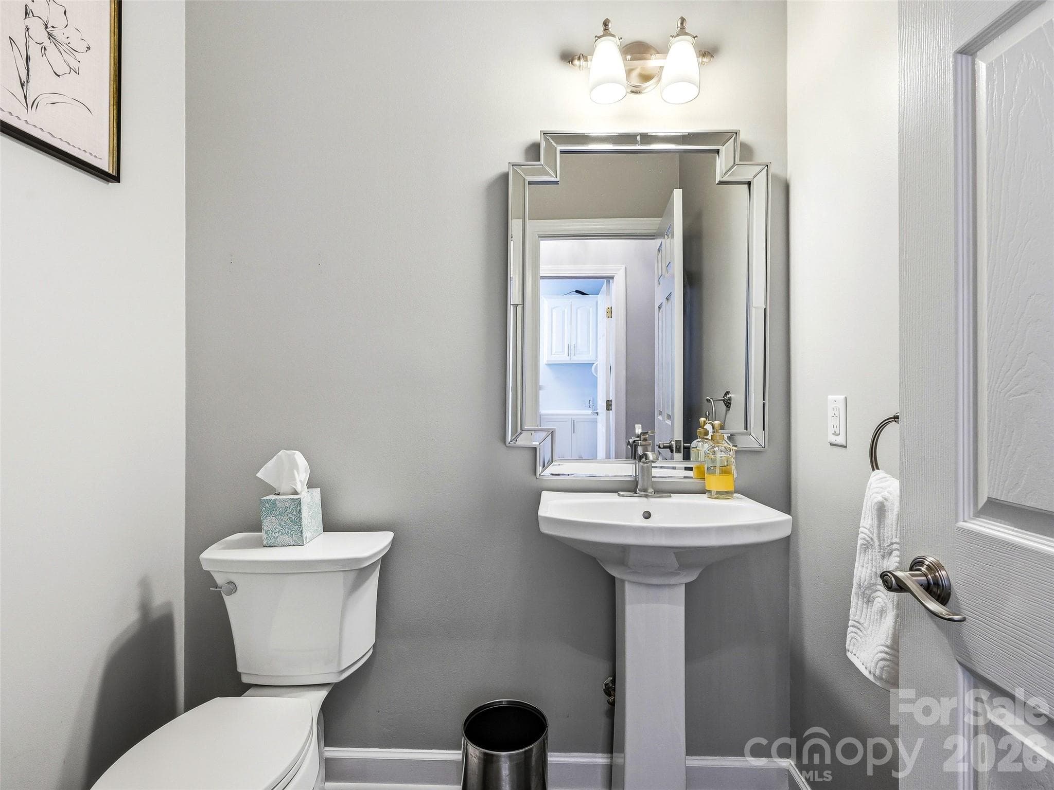 Main floor powder room. - 32 Franklin Farm Road, Fletcher