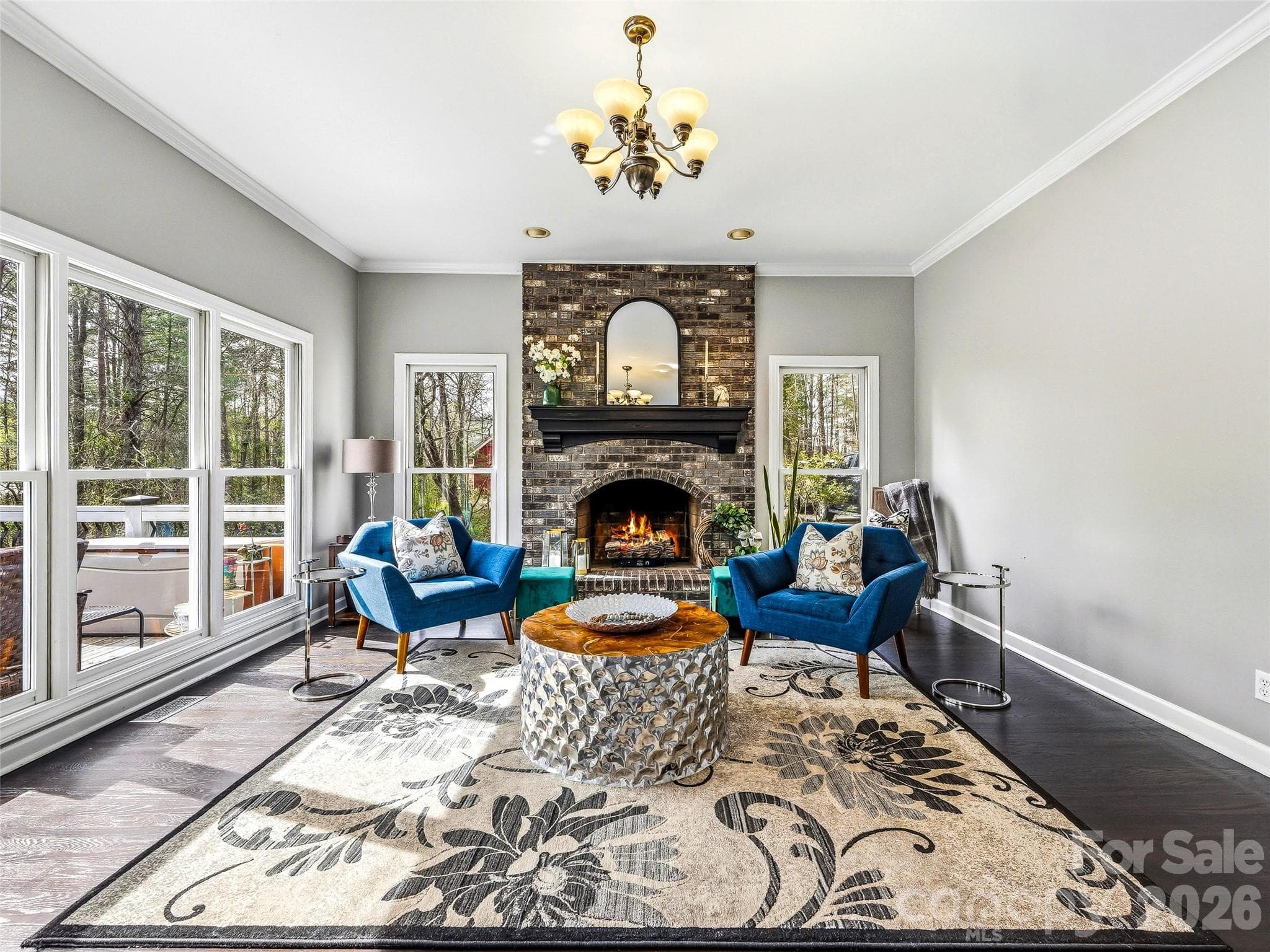 Family room with natural gas fireplace. - 32 Franklin Farm Road, Fletcher