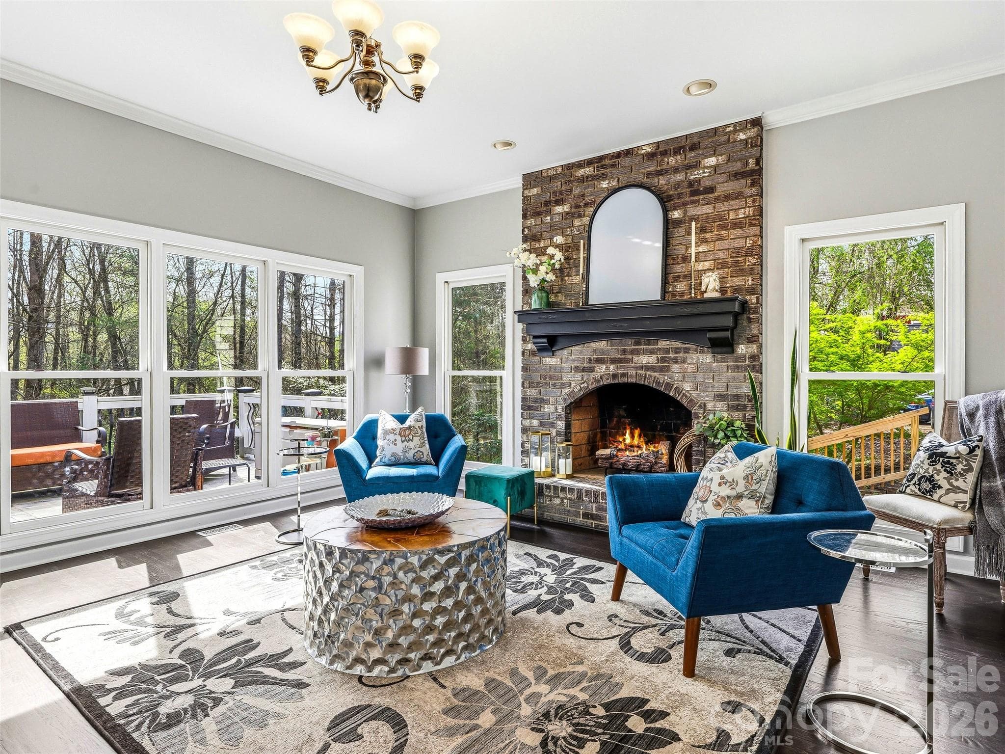Family room with views of the back deck. - 32 Franklin Farm Road, Fletcher
