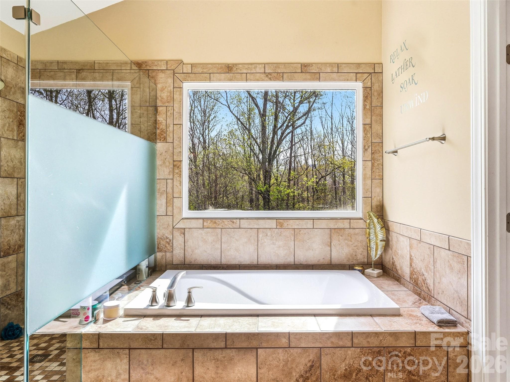 Soaking tub with a view of the backyard. - 32 Franklin Farm Road, Fletcher