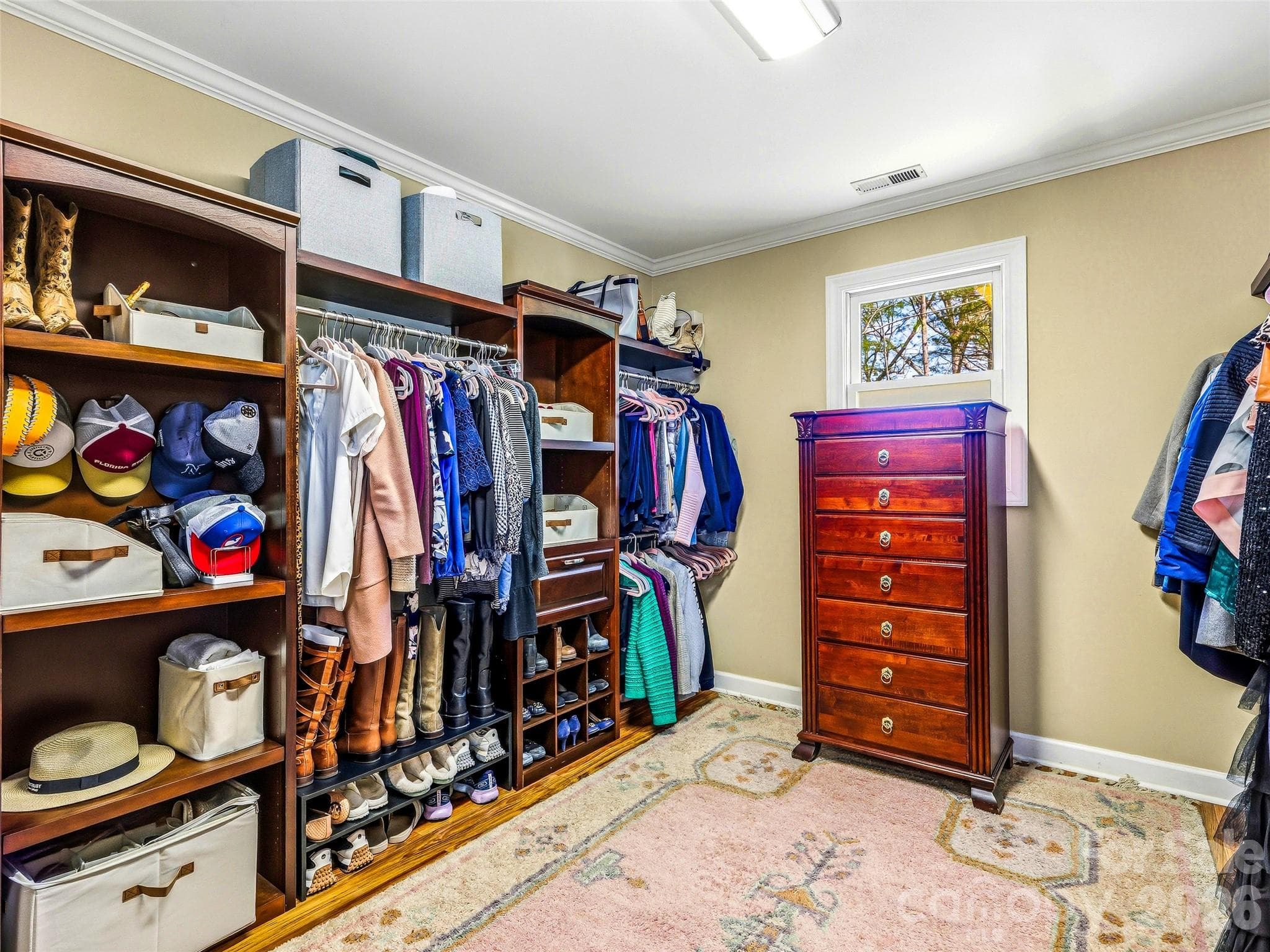 Large walk in closet in the primary suite. - 32 Franklin Farm Road, Fletcher