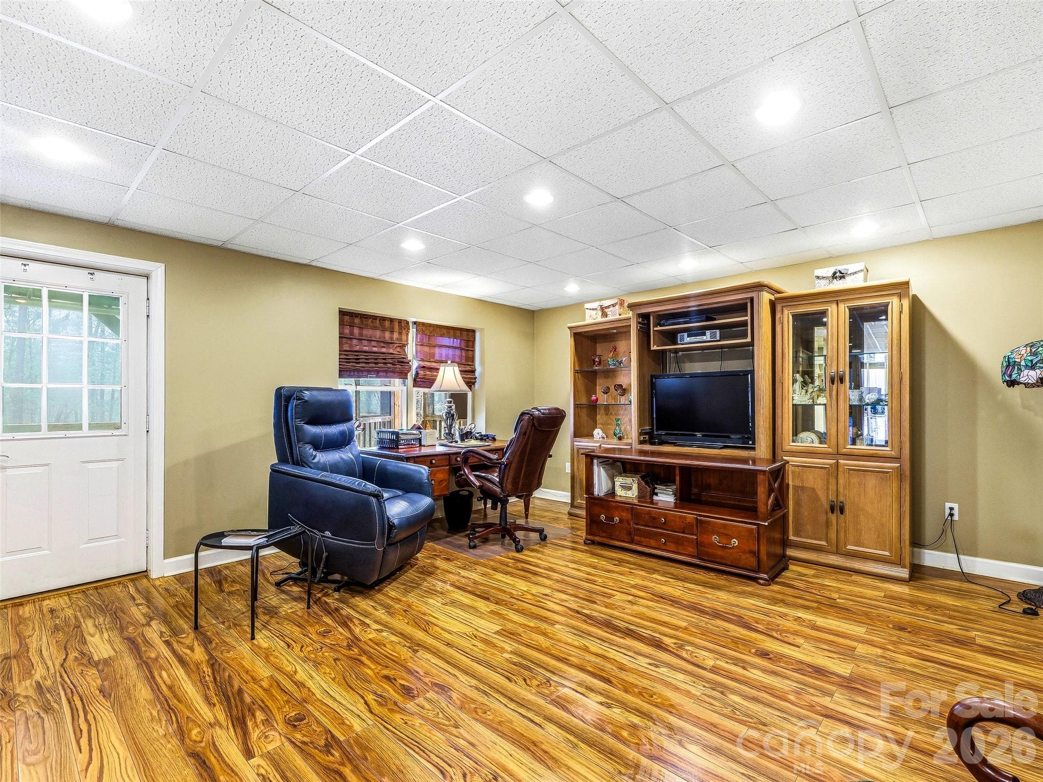 Guest suite living room. - 32 Franklin Farm Road, Fletcher