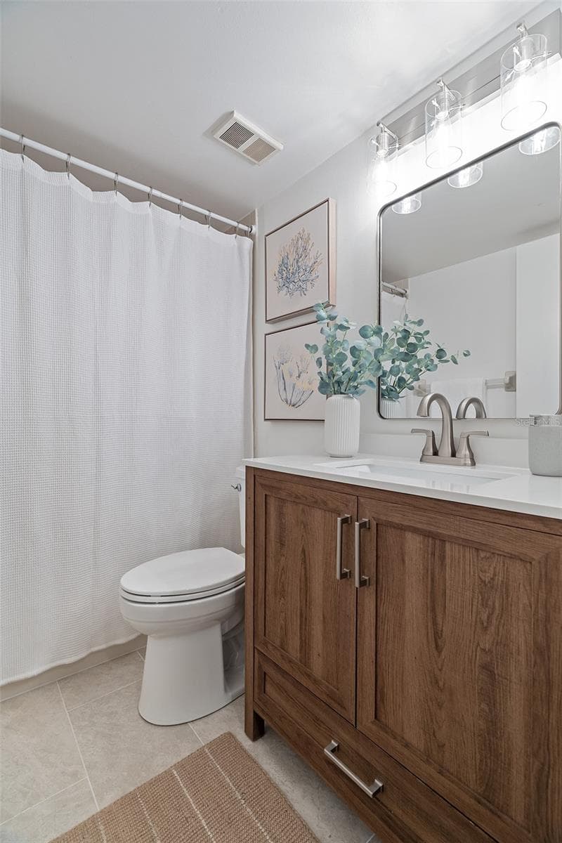 Updated hallway bathroom - 200 INTERNATIONAL DRIVE #815, CAPE CANAVERAL