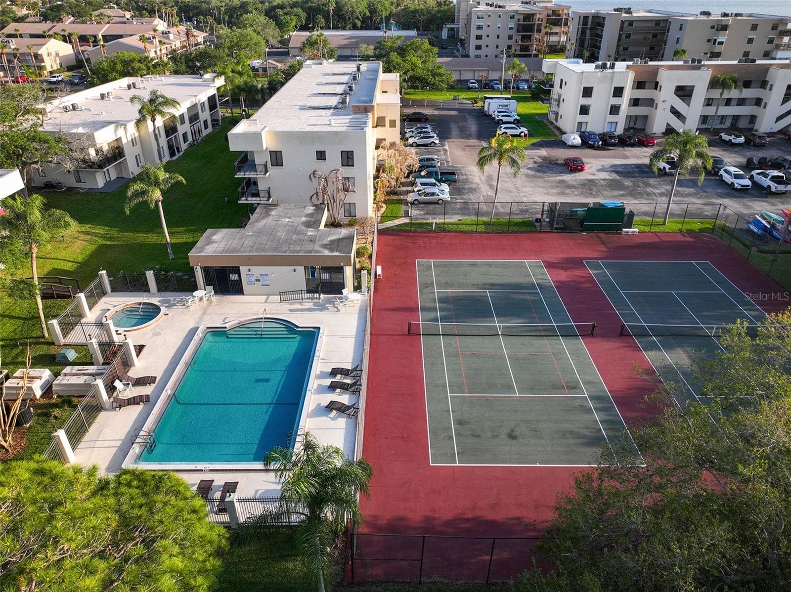 Unit is right across from Hot Tub, Sauna, Pool, Tennis Courts and Pickleball lines - 200 INTERNATIONAL DRIVE #815, CAPE CANAVERAL