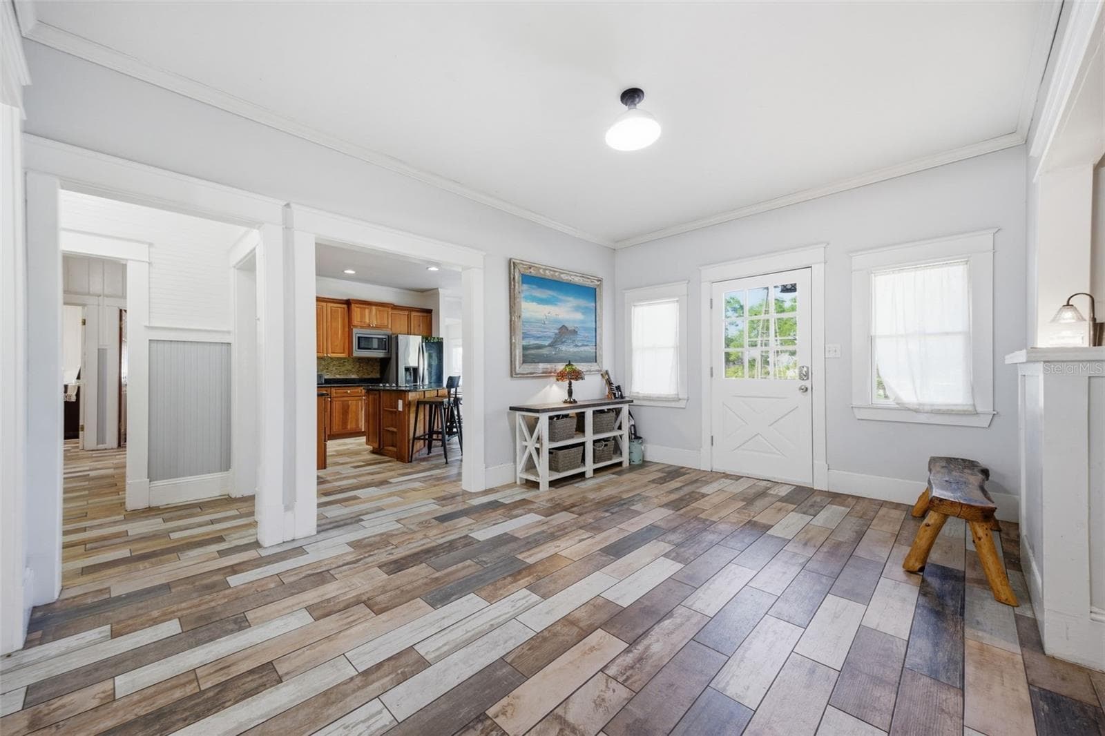 View of Front Door, Kitchen and hallway from the dining room - 3752 OLD KEYSTONE RD, TARPON SPRINGS