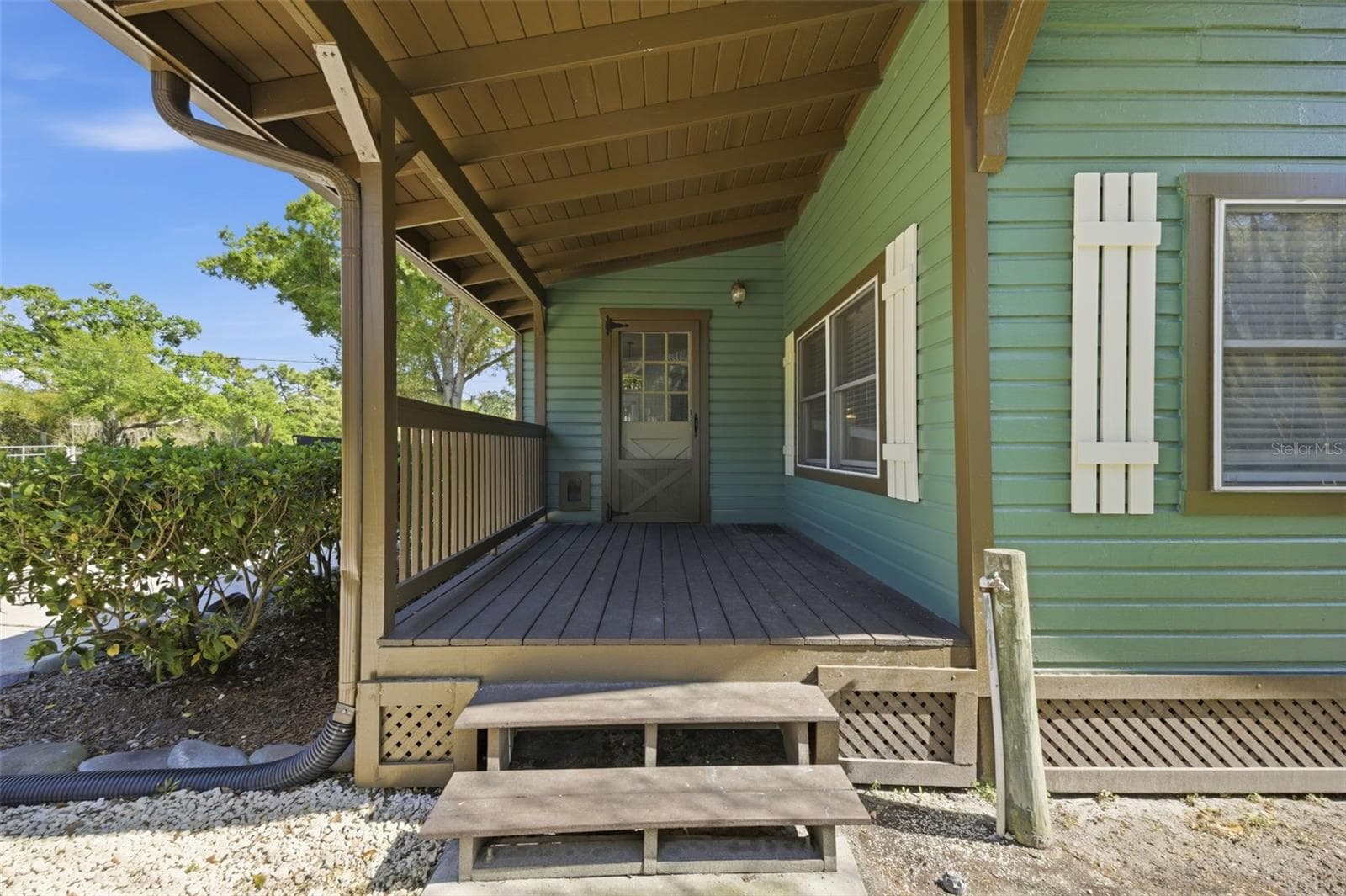 Side Porch off the kitchen toward 3 Car garage - 3752 OLD KEYSTONE RD, TARPON SPRINGS