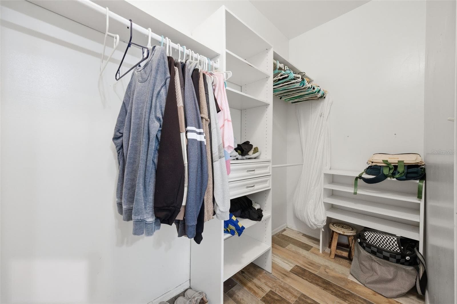 1 of 2 Spacious closets in Primary Bedroom - 3752 OLD KEYSTONE RD, TARPON SPRINGS