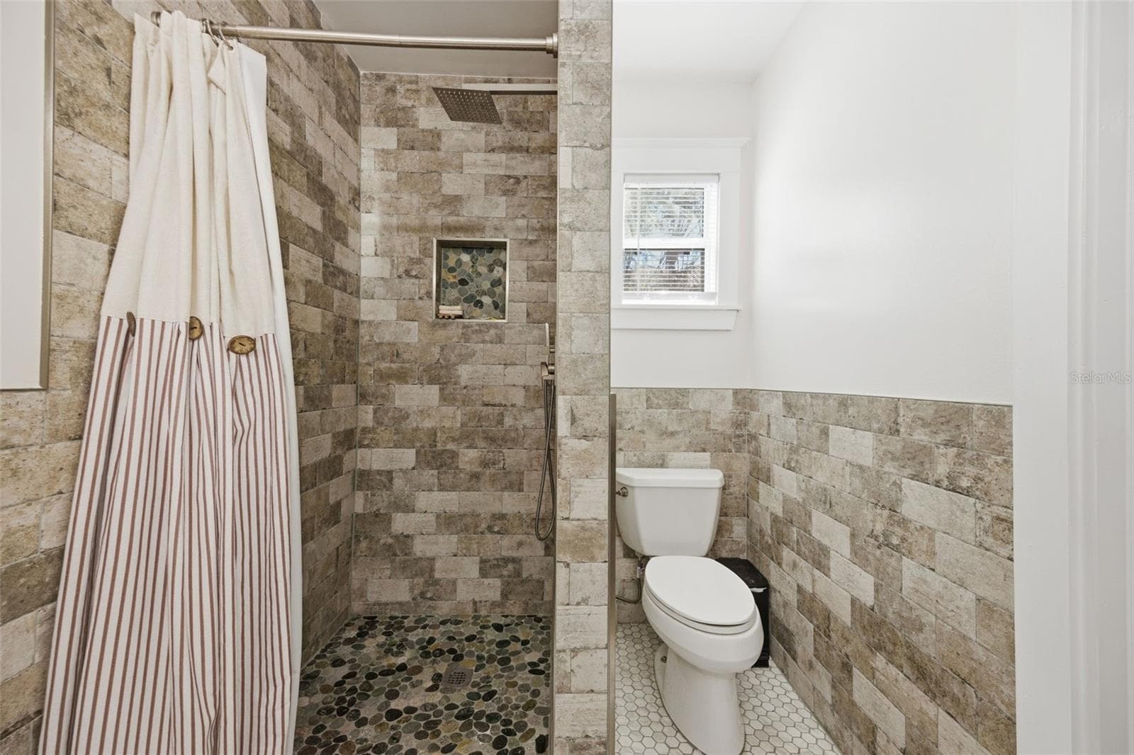 Primary shower with tucked away toilet - 3752 OLD KEYSTONE RD, TARPON SPRINGS