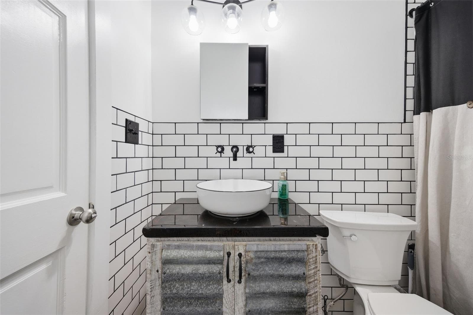 Bathroom 2-modern farmhouse with sleek vessel sink - 3752 OLD KEYSTONE RD, TARPON SPRINGS