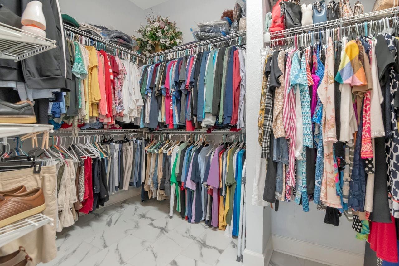 Primary walk in closet - 4170 BARLETTA CT, WESLEY CHAPEL