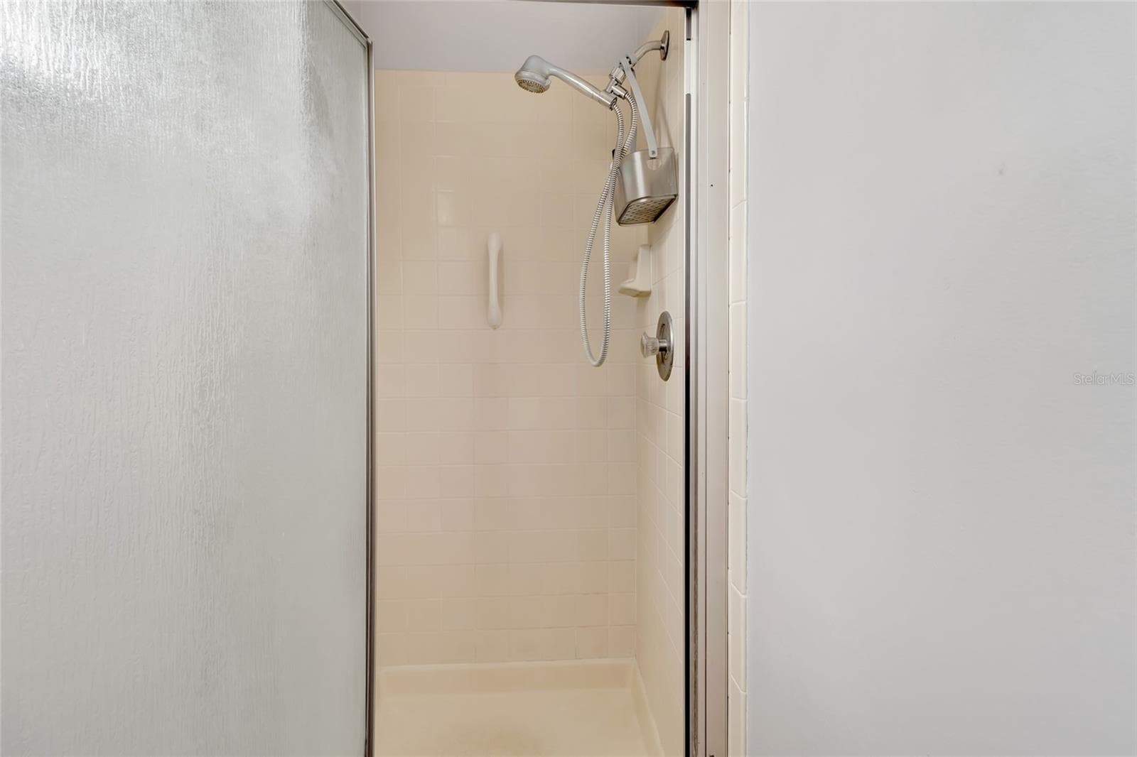 Step in shower in the Primary bedroom - 27 GORDON CT, LEESBURG