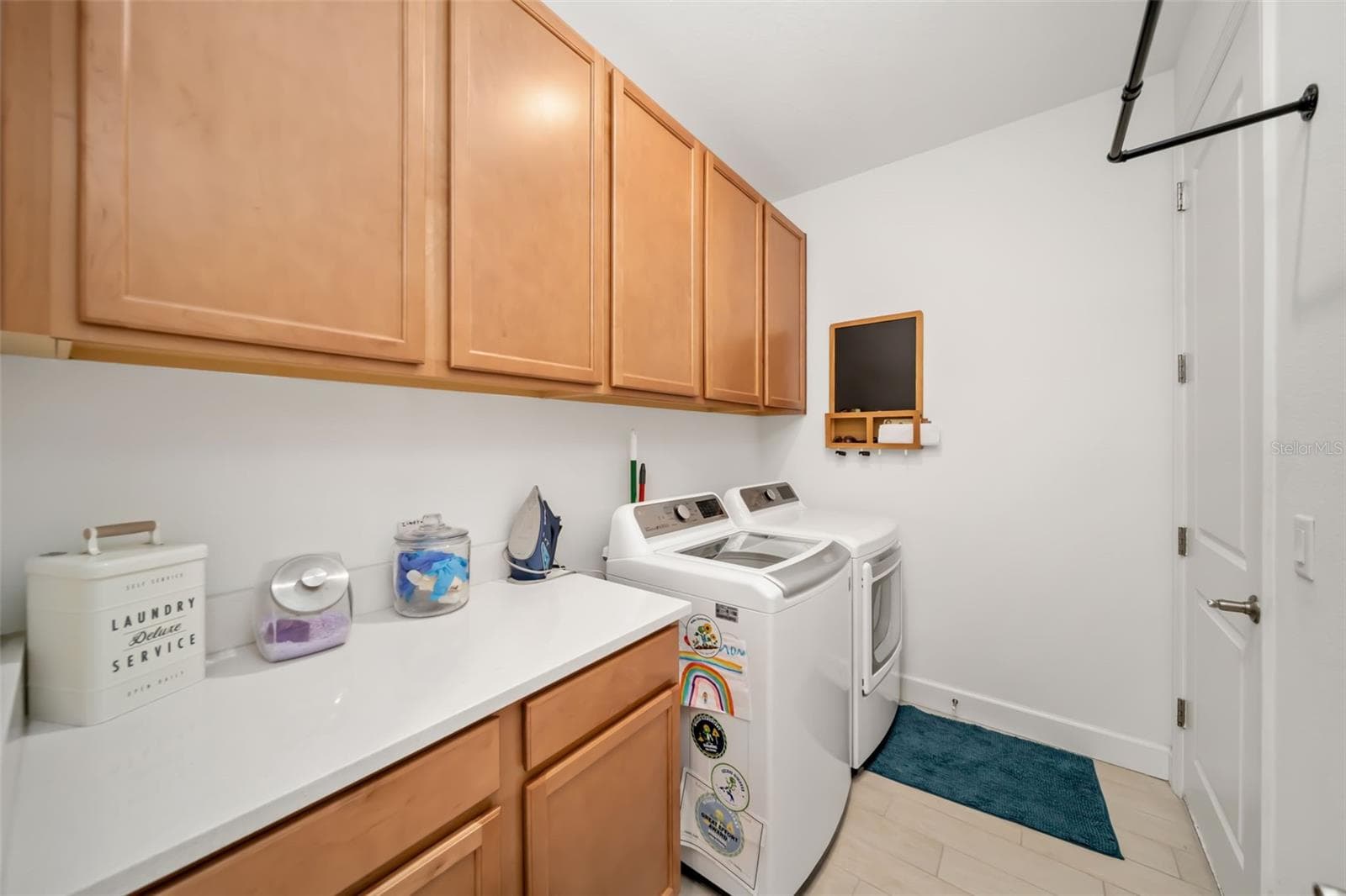 Laundry Room with Built In Cabinets - 4520 POND BROOK CT, LAKEWOOD RANCH