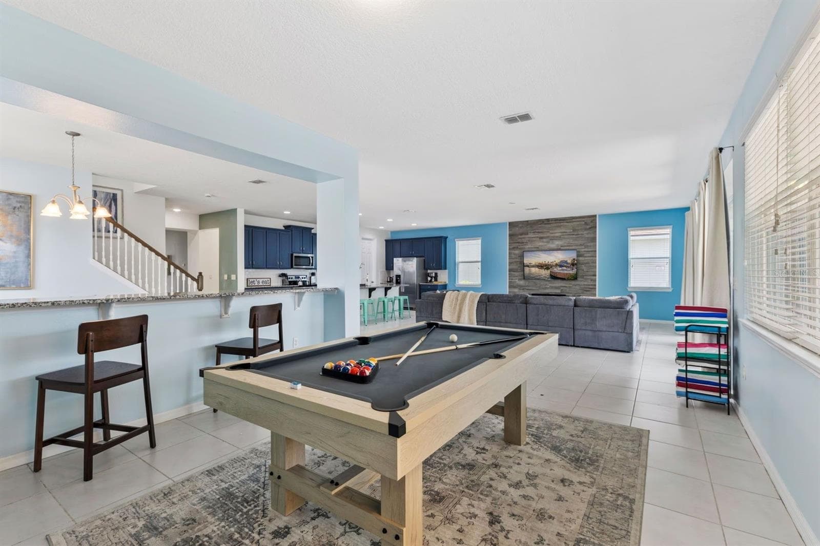 Pool table in living area - 9042 SUNSHINE RIDGE LOOP, KISSIMMEE