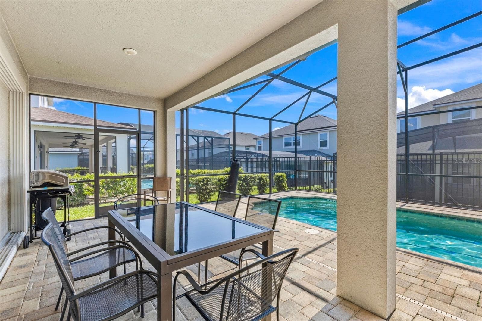Covered outdoor dining & BBQ - 9042 SUNSHINE RIDGE LOOP, KISSIMMEE