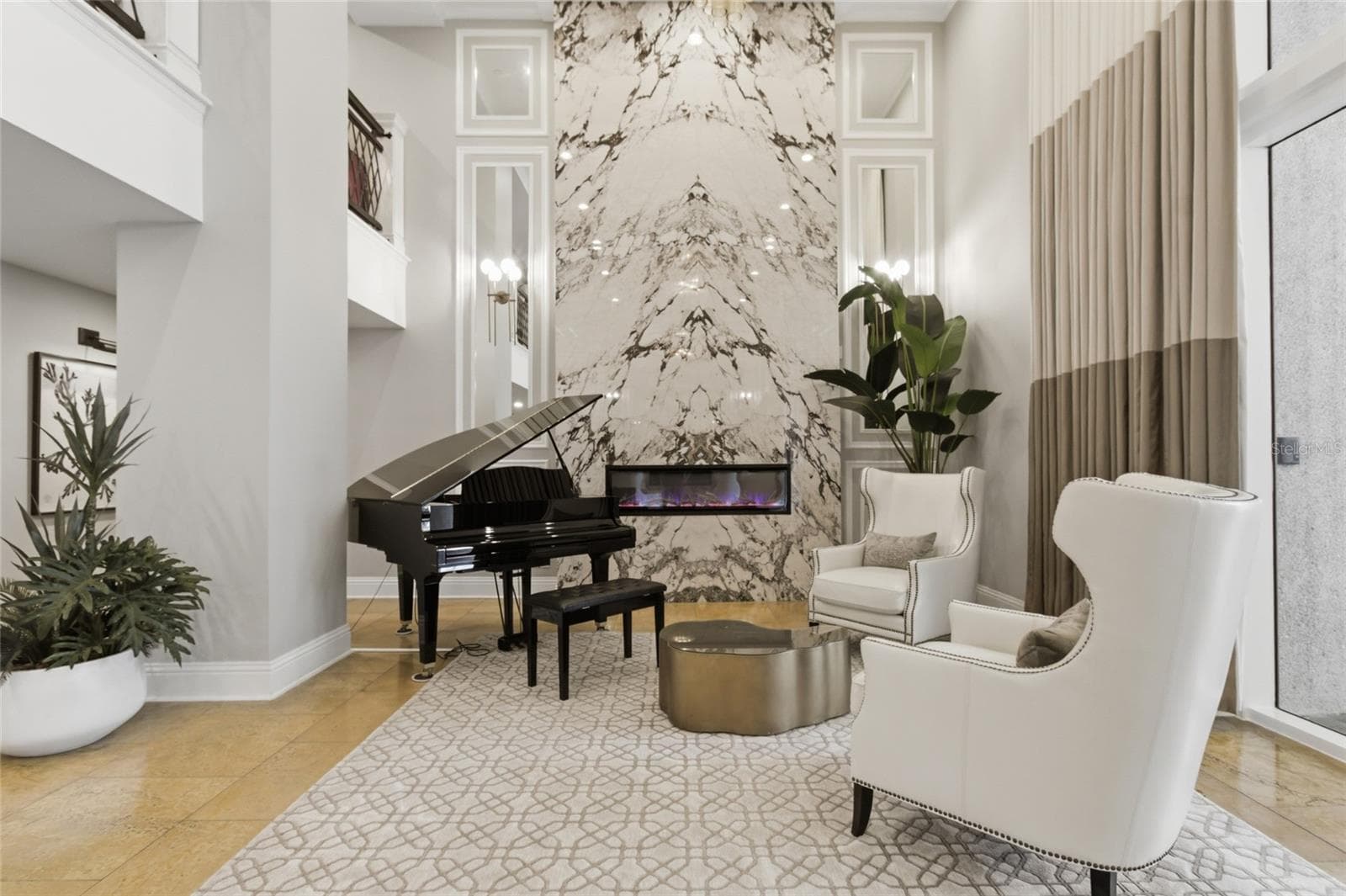 Lobby boating baby grand piano and cozy fireplace. - 11 BAYMONT ST #608, CLEARWATER BEACH
