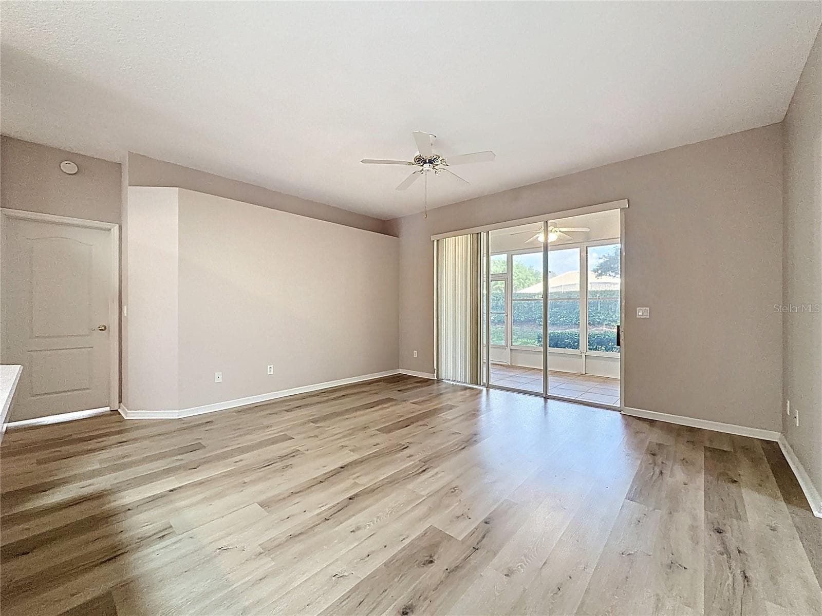 Family Room w/ entry to primary bedroom - 2308 TWICKINGHAM CT, CLERMONT