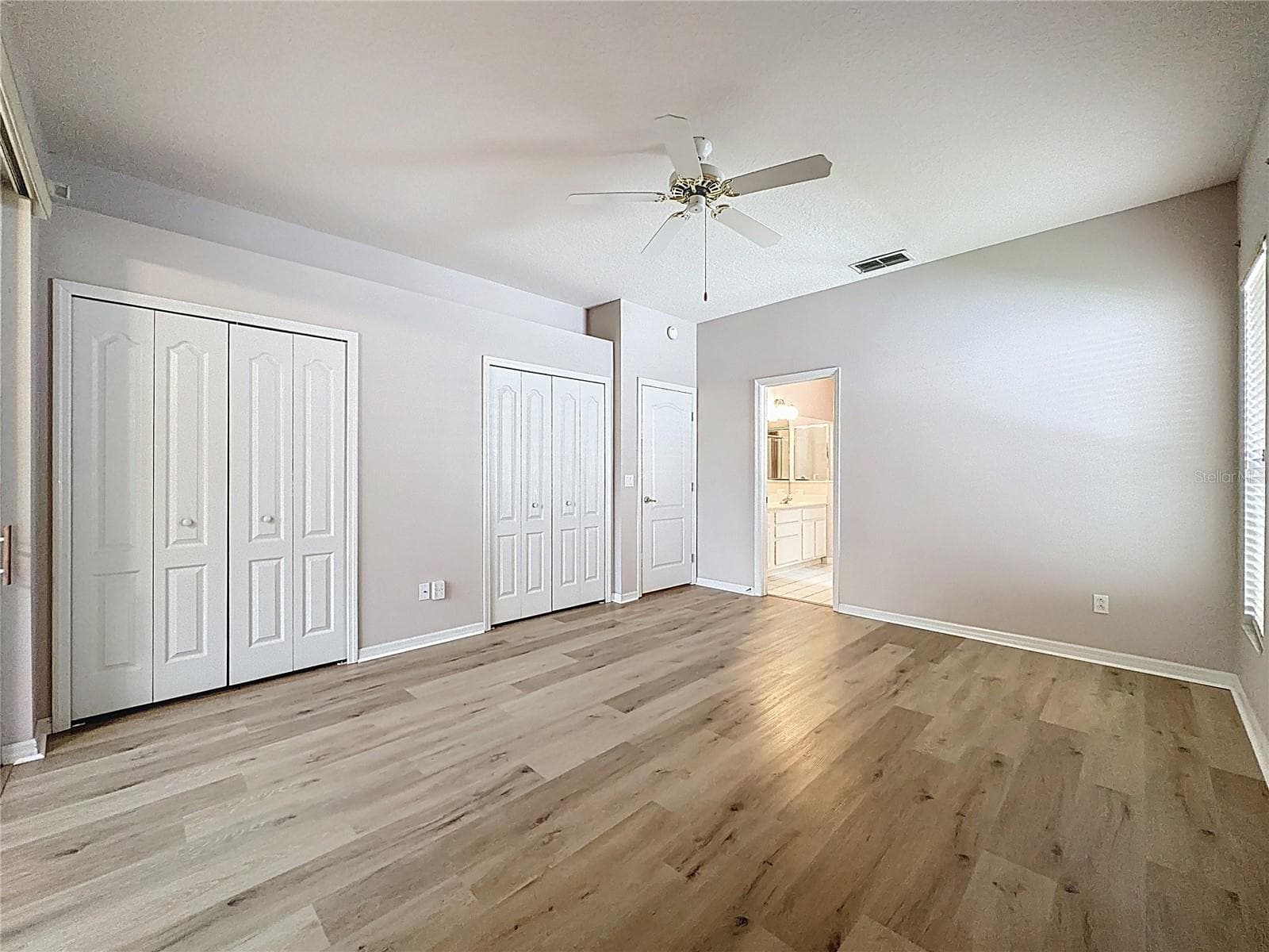 Primary Bedroom w/ en suite bath - 2308 TWICKINGHAM CT, CLERMONT