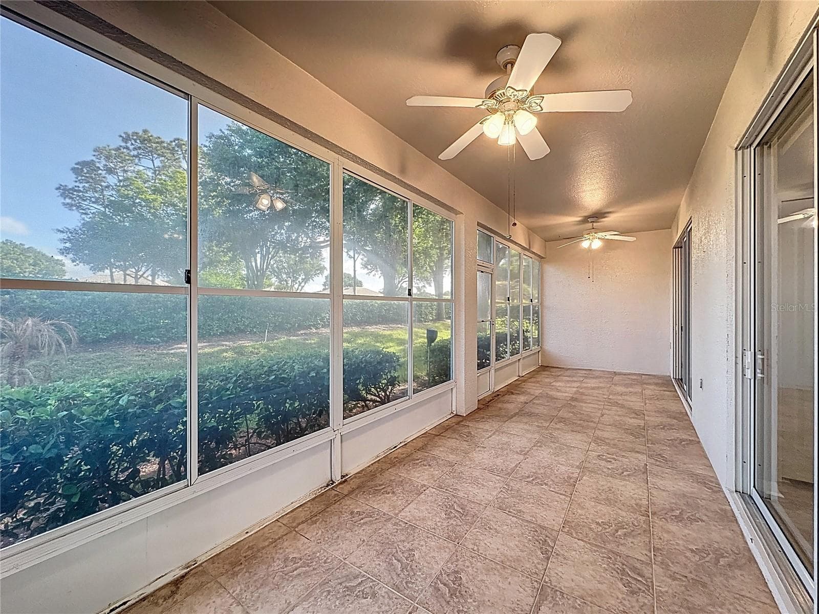 Lanai with view out back - 2308 TWICKINGHAM CT, CLERMONT